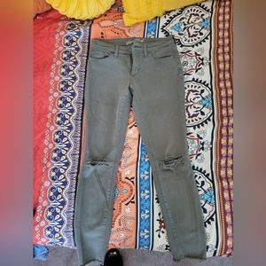 Green skinny jeans